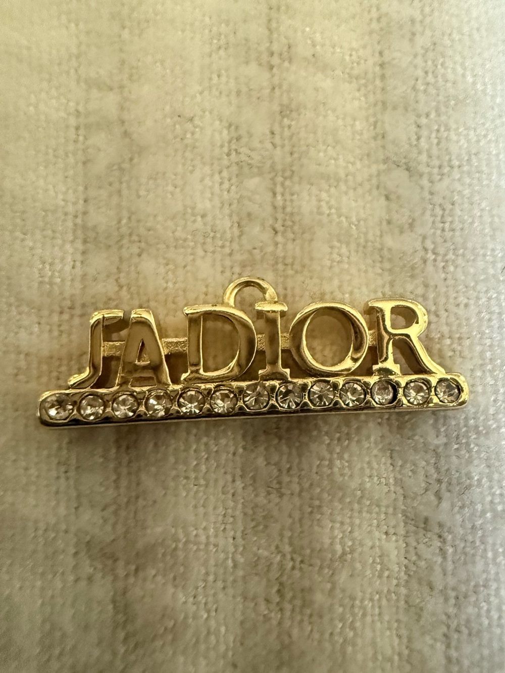 Tiny Gold Tone Logo Charm with Rhinestones